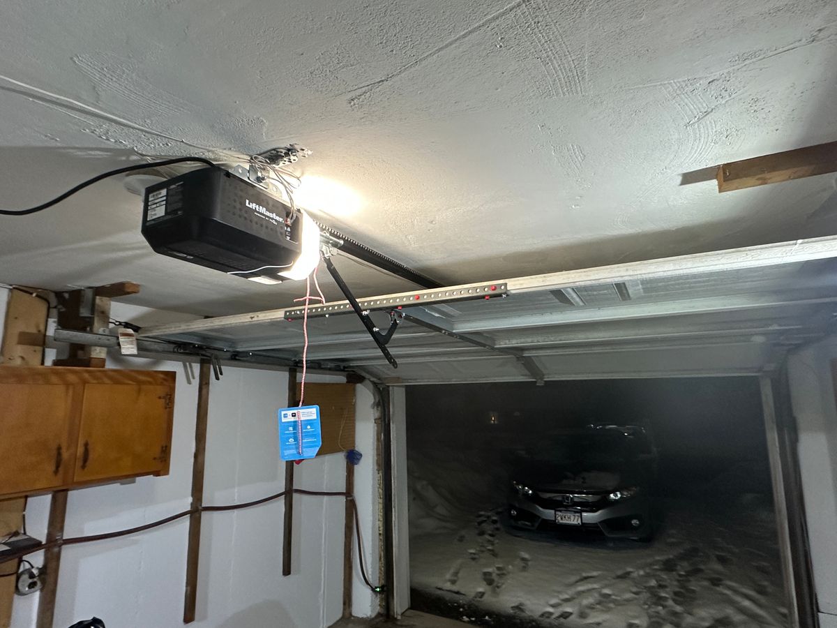 LiftMaster garage door opener installed in residential garage with MyQ smart device